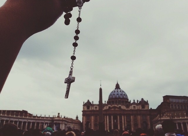 Having a rosary blessed by Pope Francis in the Vatican on Easter, Italy