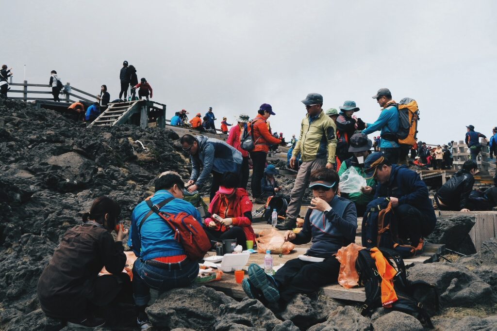 South Korean Hikers Eating and Drinking Soju