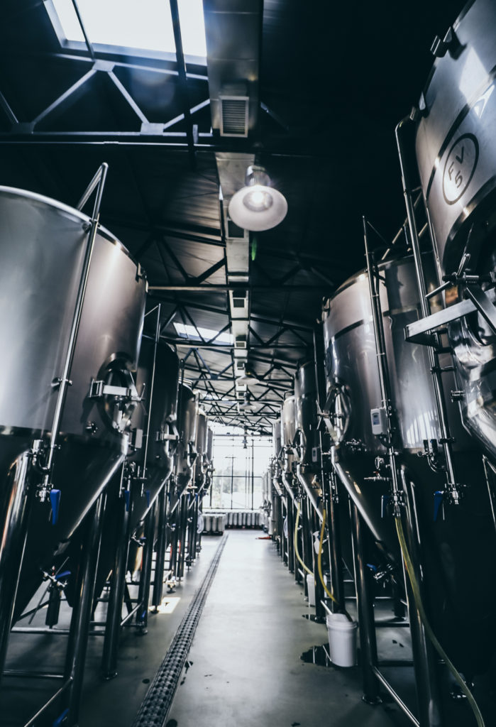 Magpie Brewery Tour in Jeju Korea takes you through the fermenters