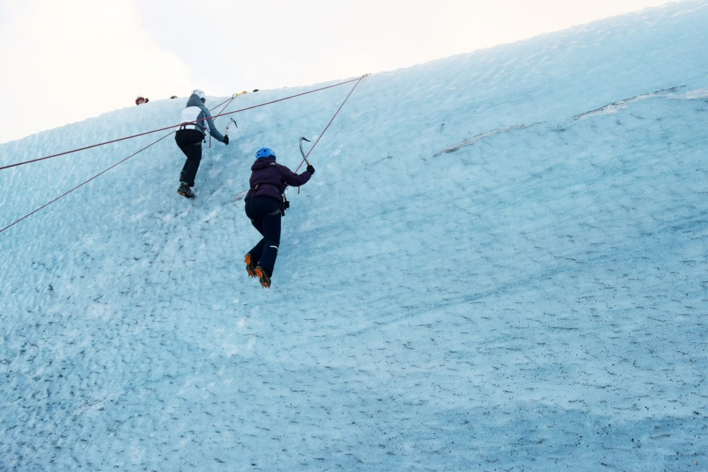 Two Climbers Ice Climbing in Iceland: Top Iceland Attractions