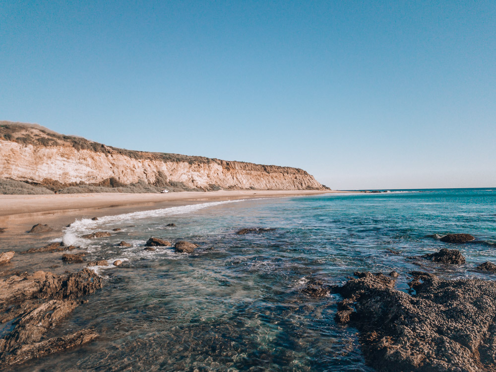 Crystal Cove shore. Walking along this shore is one of the cool things to do in Orange County