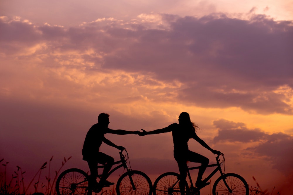 One of our staycation ideas for couples is to take a romantic bike ride
