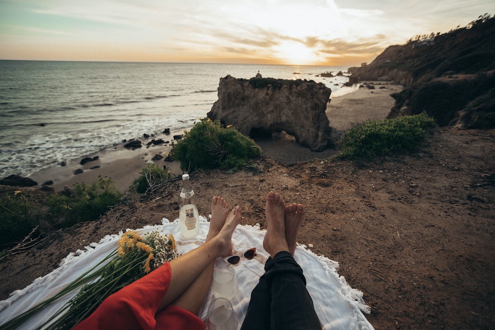 Having a romantic picnic is a perfection staycation for couples