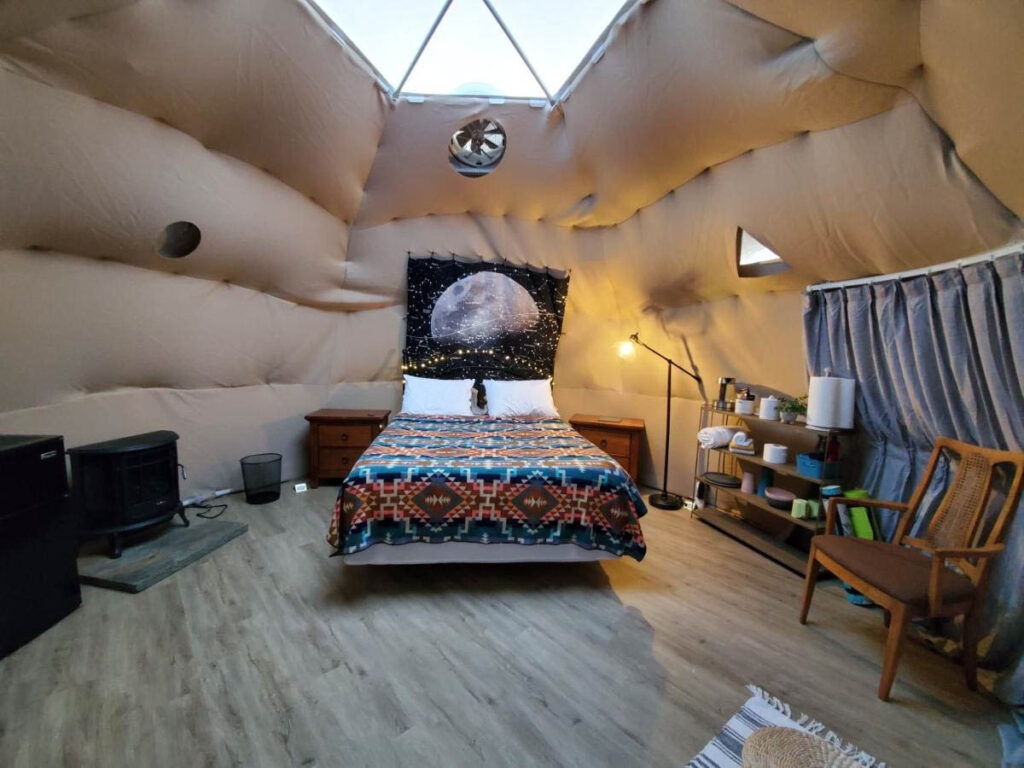 The inside of the Kosmic Tortoise, bubble domes glamping in Joshua Tree